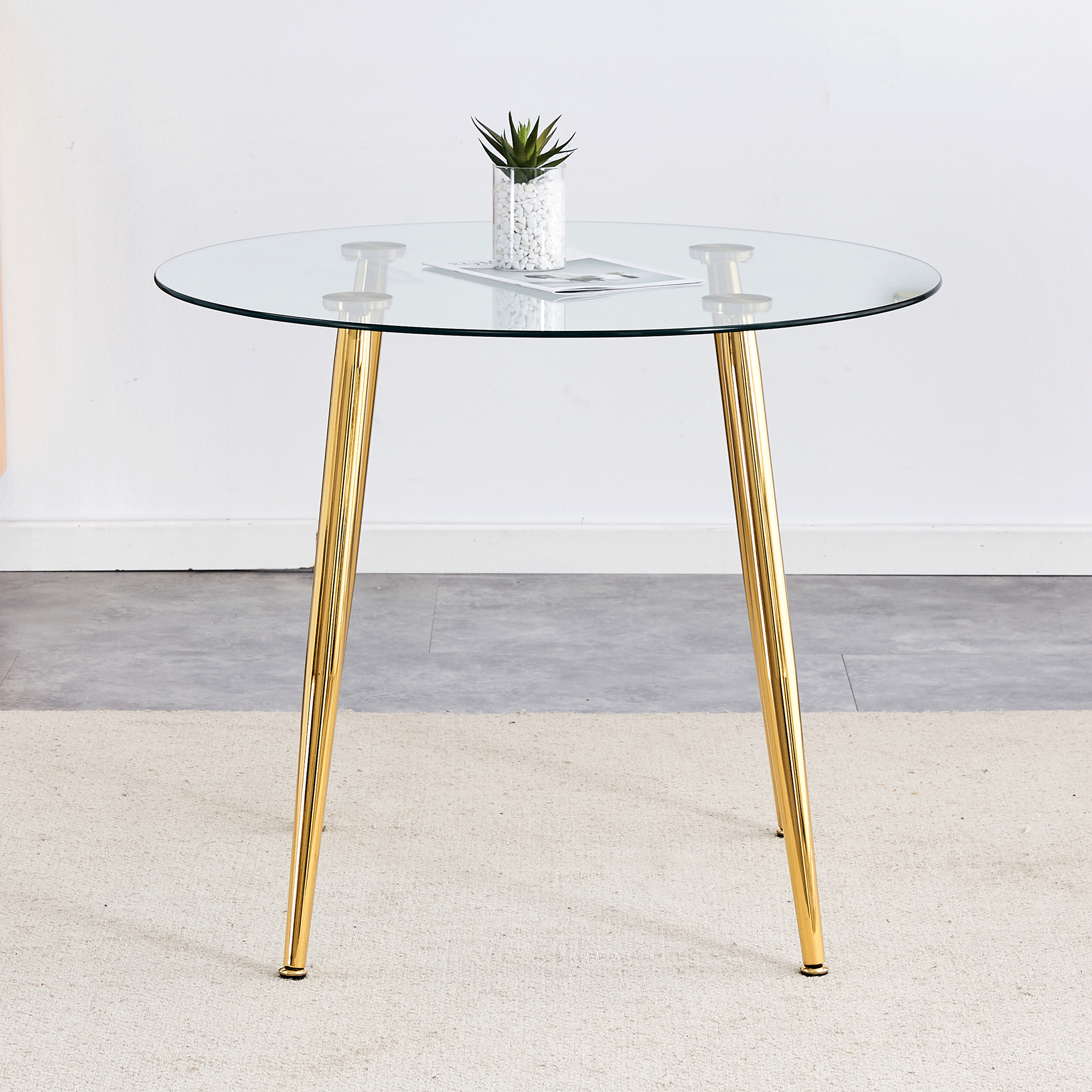 Round dining table with glass top, gilded metal legs, exquisite living, starting from the details, the gold legs show an extraordinary texture, which is the finishing touch to your home.36*36