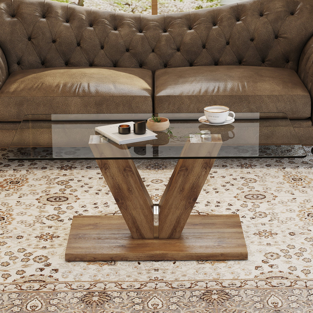 A modern minimalist style coffee table. Transparent tempered glass tabletop with wooden MDF columns. Suitable for living room and dining room.  CT-V