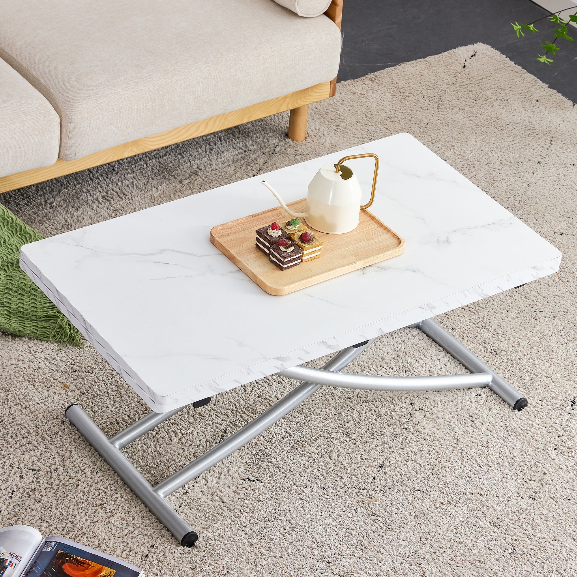 Modern minimalist multifunctional lift table with 0.8 inch MDF desktop and silver metal legs, can be used as a dressing table, coffee table, dining table, and office table