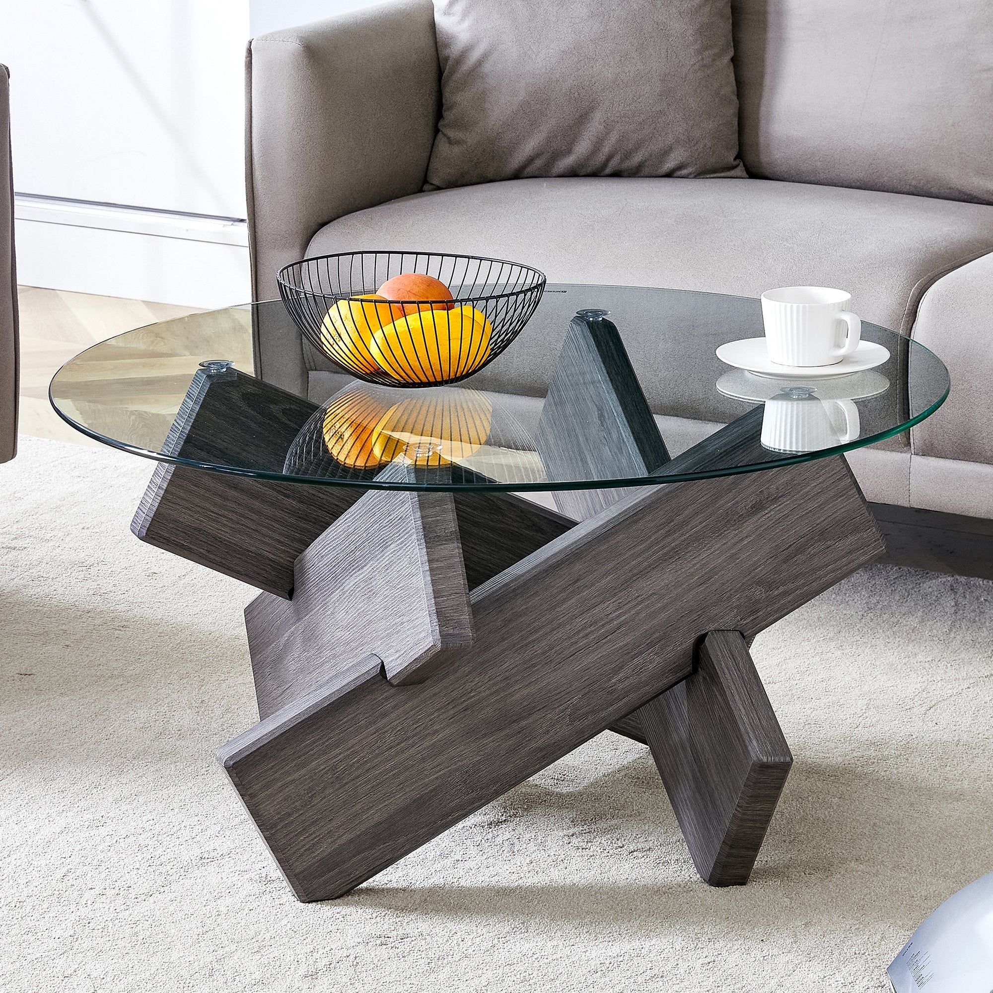 Round glass coffee table, 33.4" modern design unique coffee table. Tempered glass top with grey patterned MDF legs. Suitable for living and dining rooms