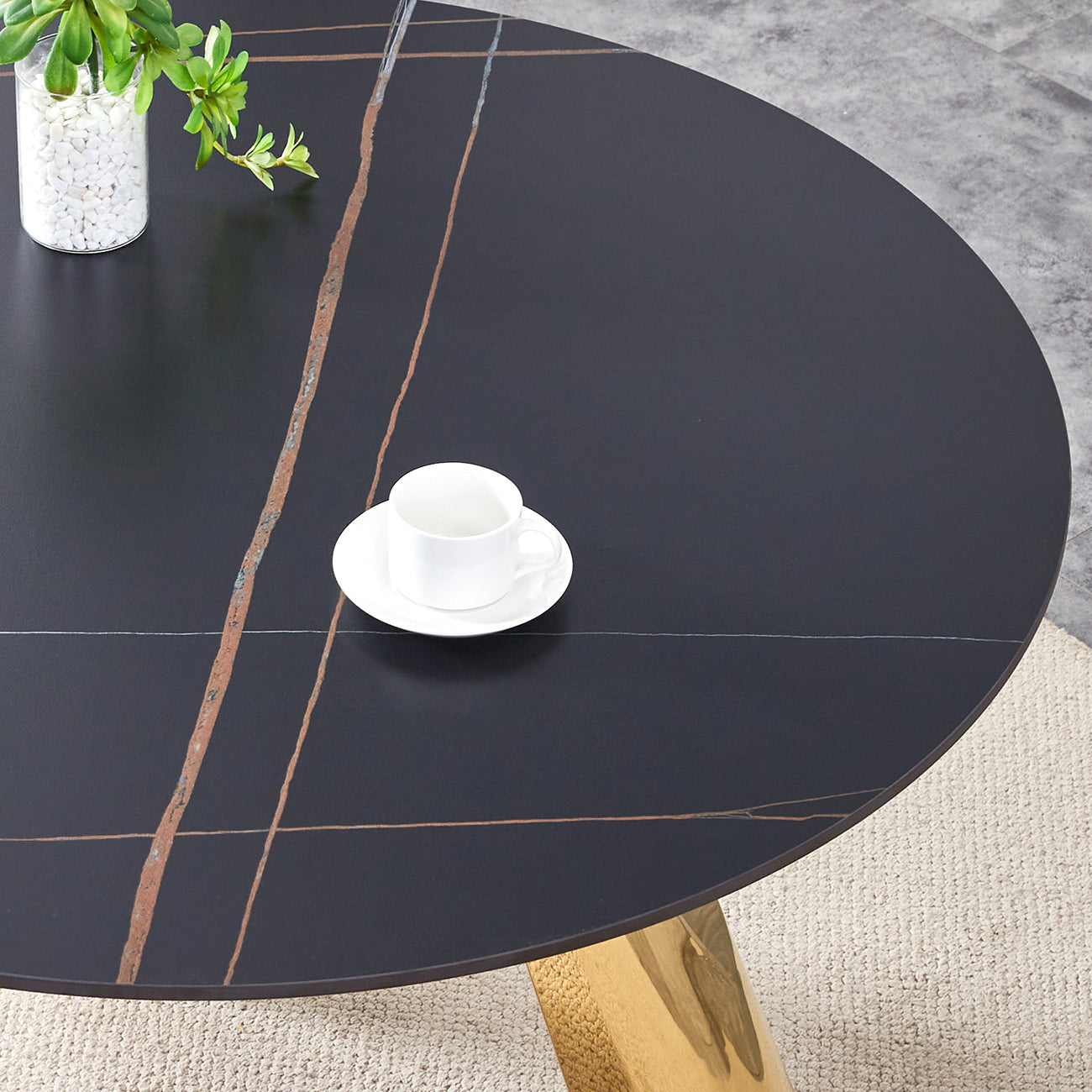 The 42-inch stainless steel gold-plated flamed granite round table with seating for 4 or 6 people is perfect for dining, entertaining, or as a conference table