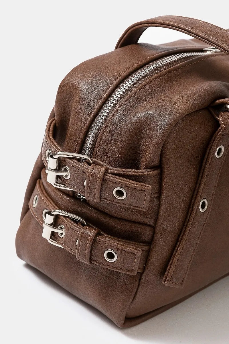 Fame Multi Grommet Belt Strap Rustic Rectangular Hand Bag