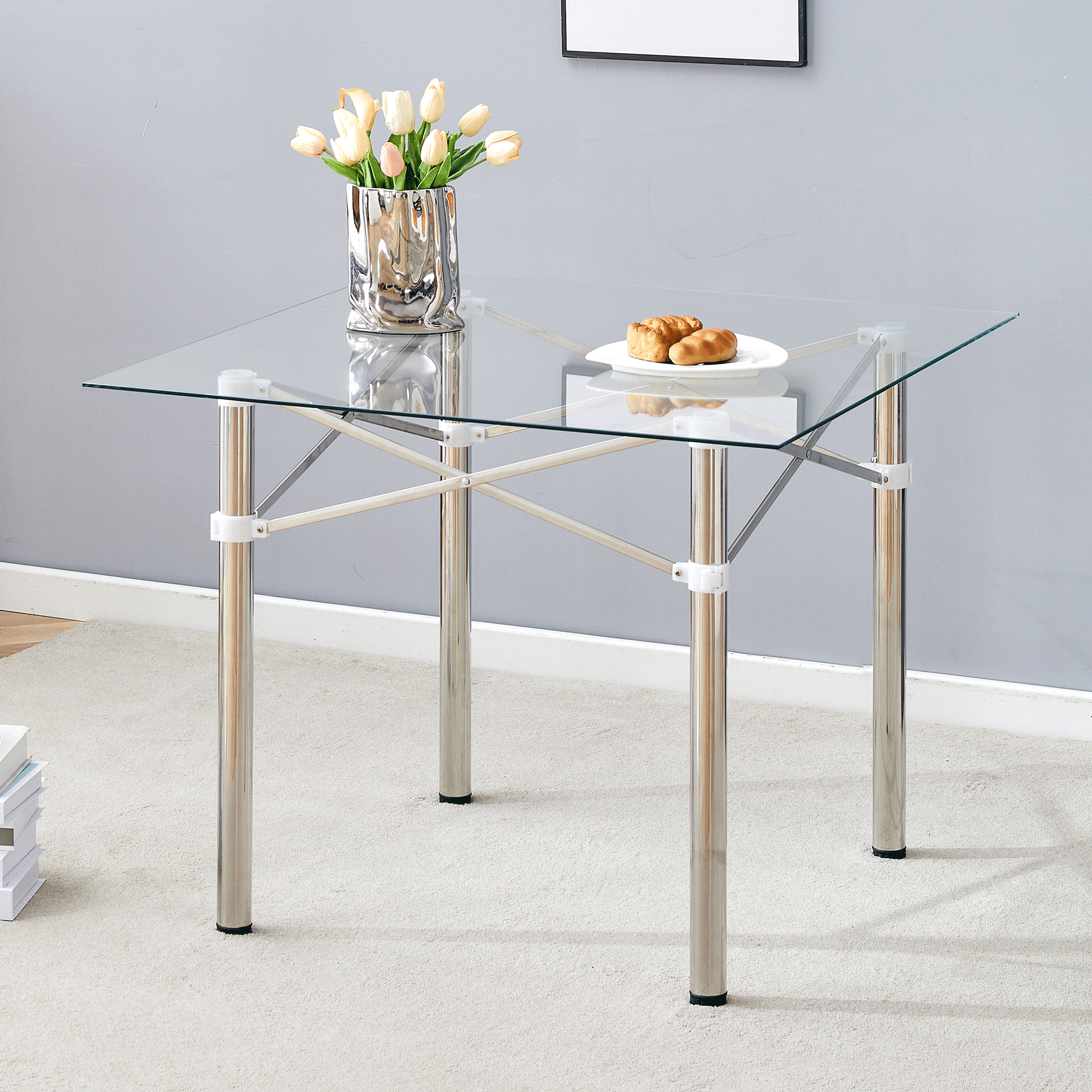Elegant Expandable Square Glass Table - 36' Clear Tempered Glass, Silver Metal Legs.Telescopic metal legs, transparent square glass tabletop, suction cup attachment connection.