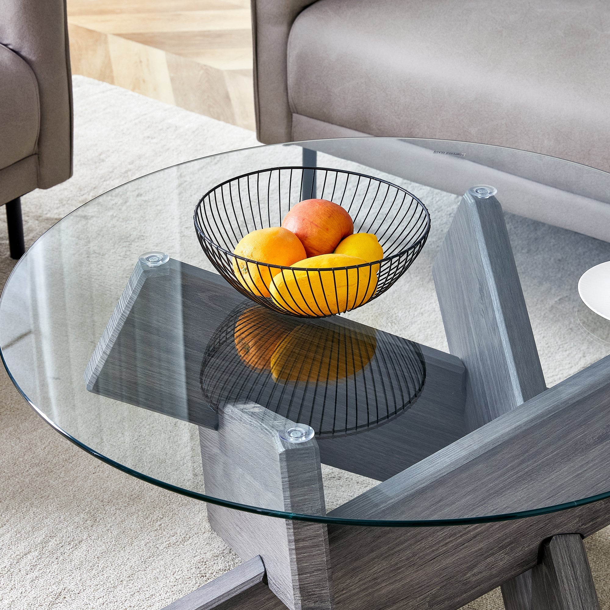 Round glass coffee table, 33.4" modern design unique coffee table. Tempered glass top with grey patterned MDF legs. Suitable for living and dining rooms