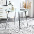 A glass tabletop with a diameter of 40 inches and a modern minimalist circular dining table with silver metal legs.Suitable for living rooms, and conference rooms.W1151S03392