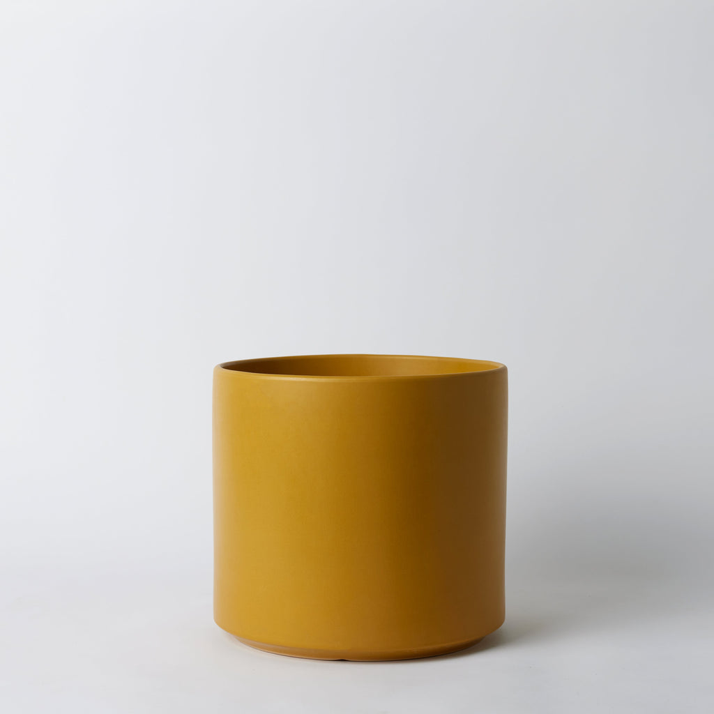 Solid Goods Ceramic Cylinder– With or Without Mahogany Stand