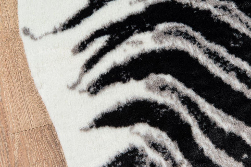 Zebra Hide‑Style Faux Fur Accent Rug