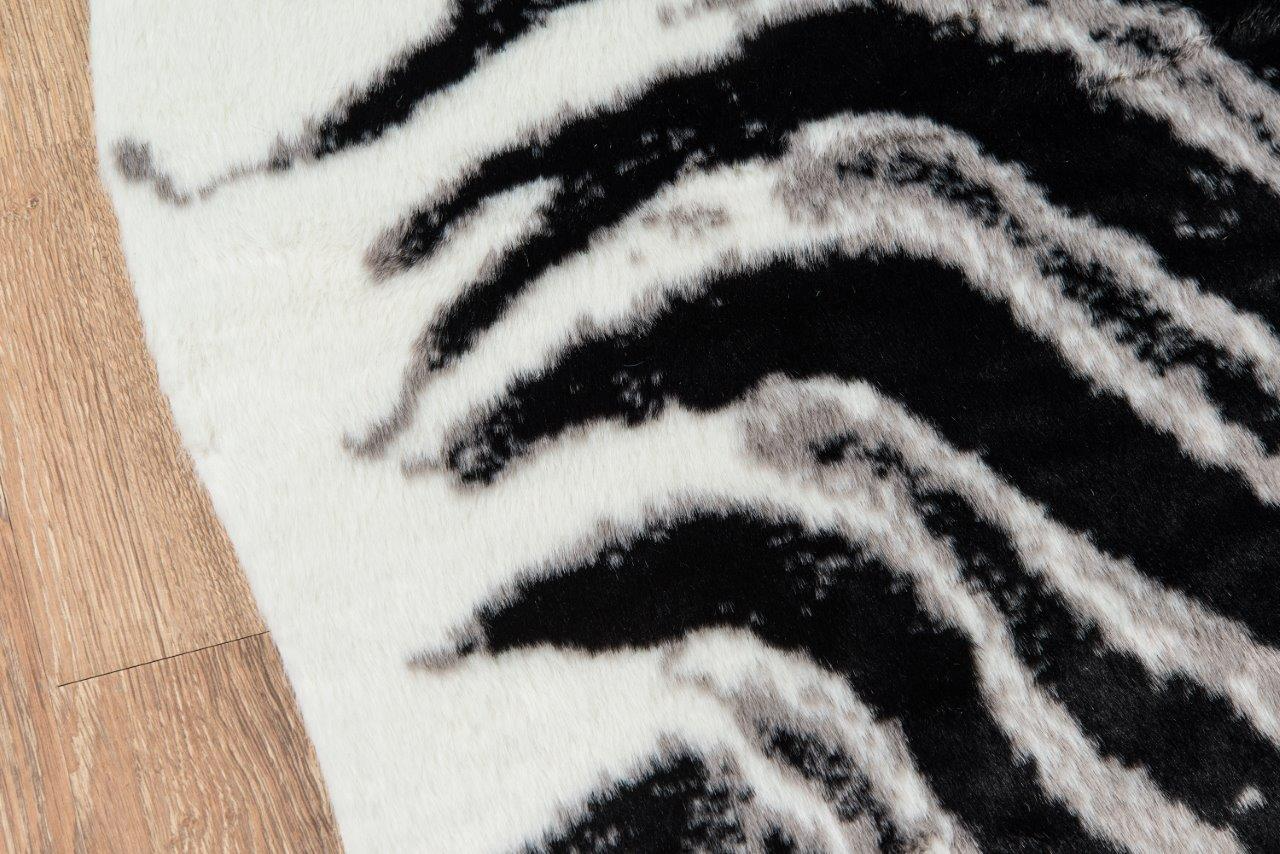 Zebra Hide‑Style Faux Fur Accent Rug