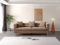 Luxurious and comfortable upholstered sofa with golden legs and pillows for living room and reception area