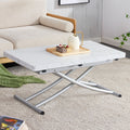 Modern minimalist multifunctional lift table with 0.8 inch MDF desktop and silver metal legs, can be used as a dressing table, coffee table, dining table, and office table