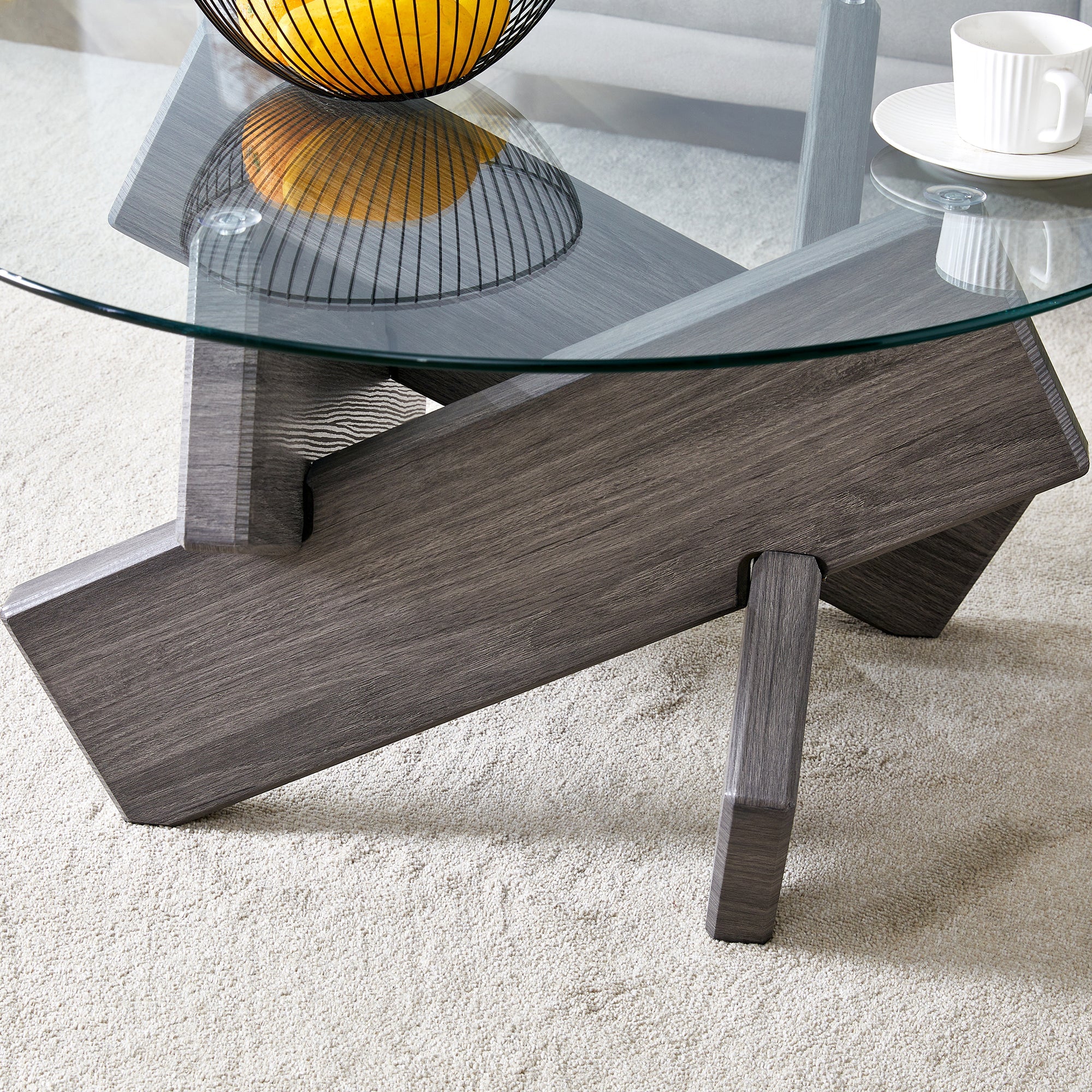 Round glass coffee table, 33.4" modern design unique coffee table. Tempered glass top with grey patterned MDF legs. Suitable for living and dining rooms